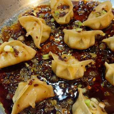 Steamed-Fried MìLà Potstickers in Mala Xianguo Sauce