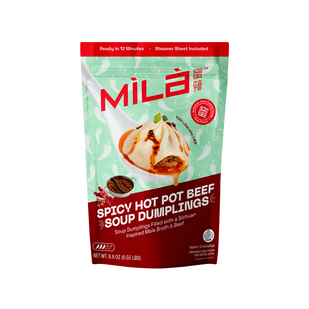 Front view of Spicy Hot Pot Beef Soup Dumplings package with chili oil dumpling and Ready in 12 Minutes text